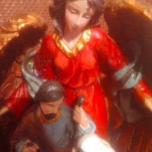 Jesus Mary Joseph and angel  nativity set lights up